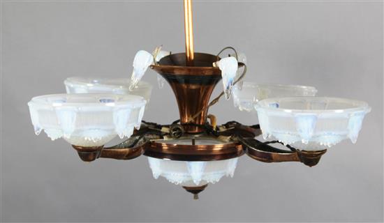 An early 20th century French coppered metal light fitting, drop 2ft, Diam. 2ft 6in.